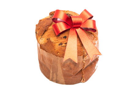 christmas panettone with red bow isolated on white backgroundの写真素材