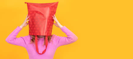 frustrated and overwhelmed woman with shopping bags
