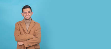 man with coat isolated smilingの写真素材