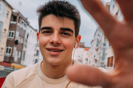 teenager with mobile phone in the cityの写真素材