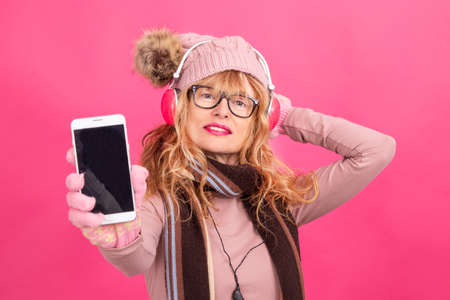 adult woman with mobile phone or smartphone isolated on background