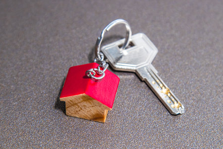 key with wooden house keychainの写真素材