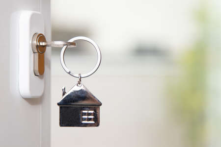 house key in the doorの写真素材