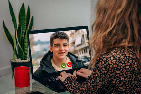 woman with video call on computer