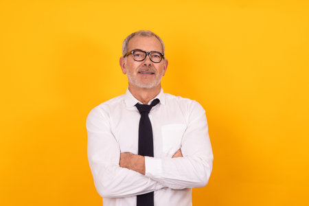 attractive successful senior man isolated on backgroundの写真素材