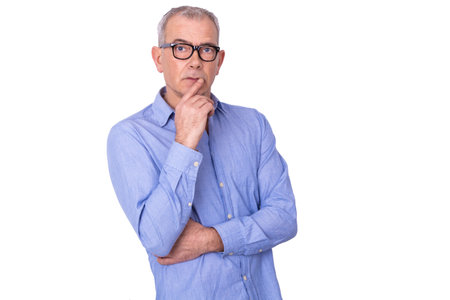 portrait of isolated adult man with gray hairの写真素材