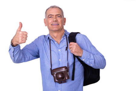 isolated man with photo camera and backpackの写真素材