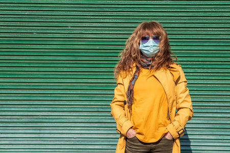 woman in the street with maskの写真素材