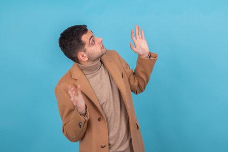 scared isolated man looking upの写真素材