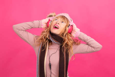 adult woman with headphones dancing on isolatedの写真素材