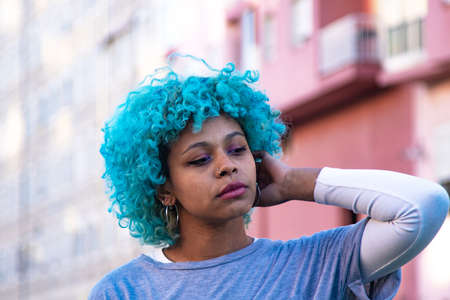 portrait black afro american woman on the streetの写真素材
