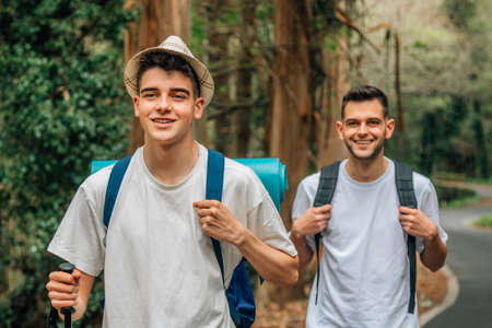 young people hiking, excursion or trekkingの写真素材