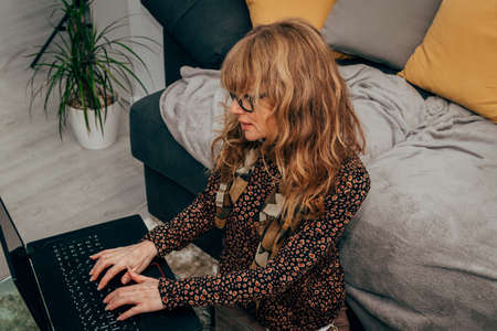woman working at home with computerの写真素材