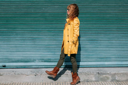 adult woman wearing sunglasses on the city street