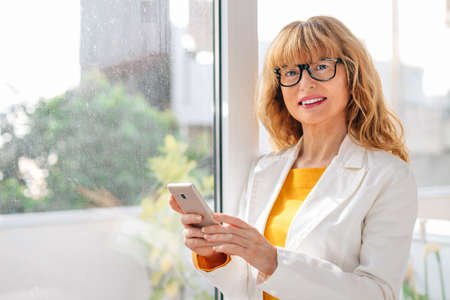 adult woman with mobile phoneの写真素材