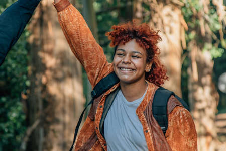 afro american woman smiling enjoying travel outdoors