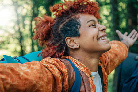 woman enjoying outdoors with expression of freedomの写真素材