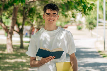 teenage student with books outdoorsの写真素材