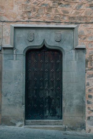 medieval door of historic building, spainの写真素材