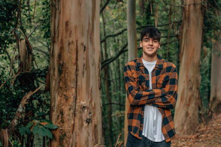 fashionable teenage boy in autumn outdoor