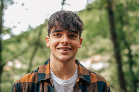 portrait of teenage boy outdoorsの写真素材