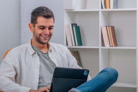 man at home with laptop