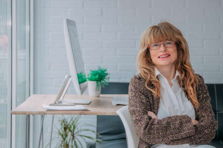 business woman in office smiling