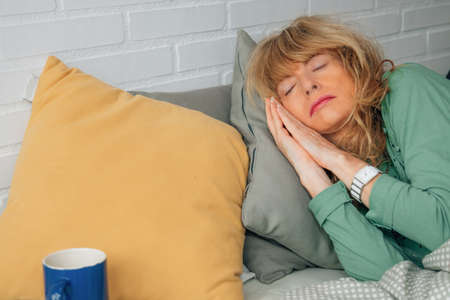 woman sleeping peacefully in bed