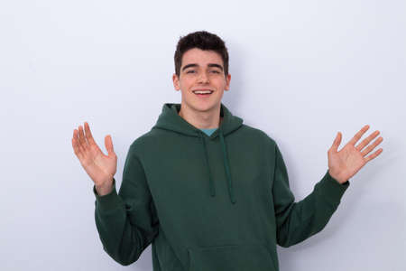 isolated teen boy with surprise expressionの写真素材