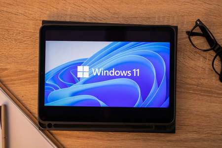Galicia, Spain - February 11, 2022: laptop on desk with windows 11