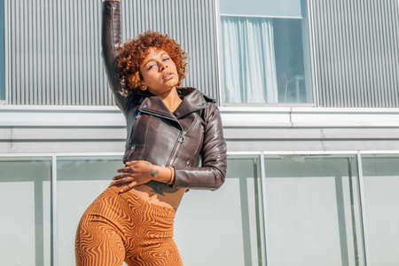 fashionable afro american girl on the street outdoorsの写真素材