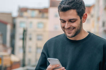 young man with mobile phone
