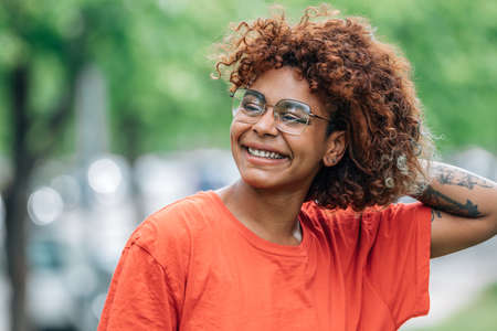african american girl smiling outdoors