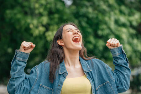 girl screaming free excited with joyの写真素材