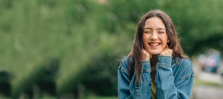 excited and excited young girl with joyの写真素材