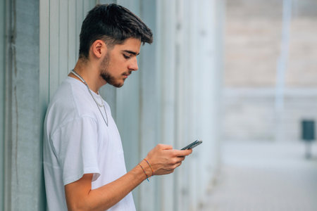 millennial on the street with mobile phone