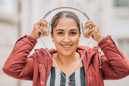girl on the street with headphonesの写真素材