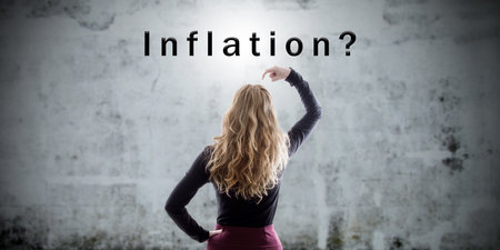 thoughtful woman with economic inflation concept