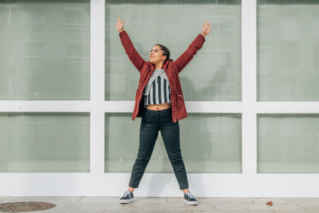 girl on the street excited with happiness and joyの写真素材