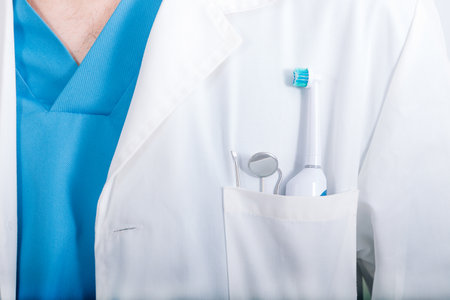 dentist uniform with dentist toolsの写真素材