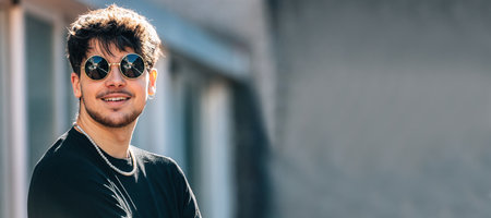 portrait of young man with sunglassesの写真素材