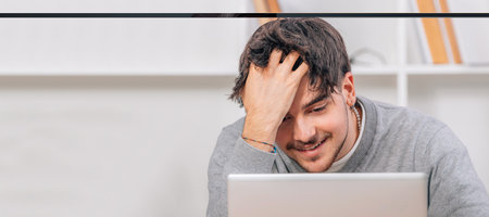 student looking at computer or laptop