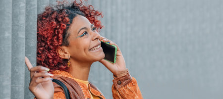 portrait smiling girl talking on mobile phone