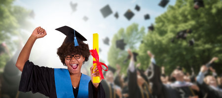 excited girl with diploma celebrating graduationの写真素材