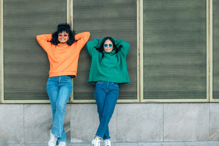 girls on the street relaxed leaning on the wallの写真素材