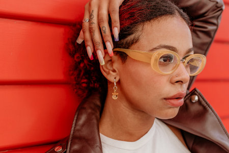 portrait of latin girl with glassesの写真素材