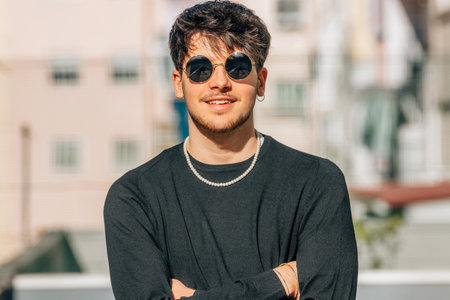 urban young man portrait with sunglasses