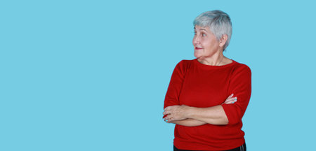 senior woman 60s isolated on color background