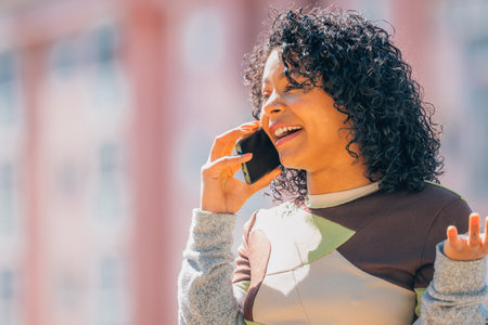 girl talking on mobile phone in the street