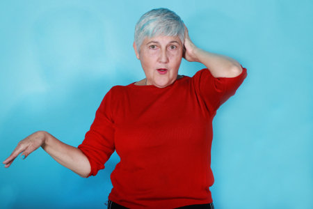 senior woman 60s isolated on color background
